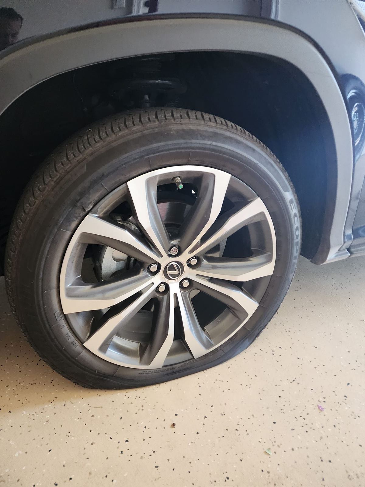 Flat tire roadside assistance and spare tire installation hero